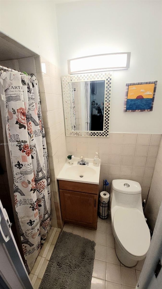 200 W 53rd Ter, Hialeah, FL 33012 - full bath with tile walls, vanity, toilet, tile patterned flooring, and curtained shower