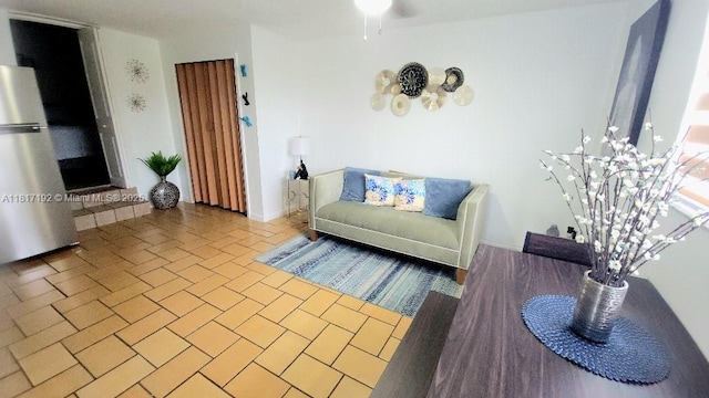 200 W 53rd Ter, Hialeah, FL 33012 - living area with ceiling fan