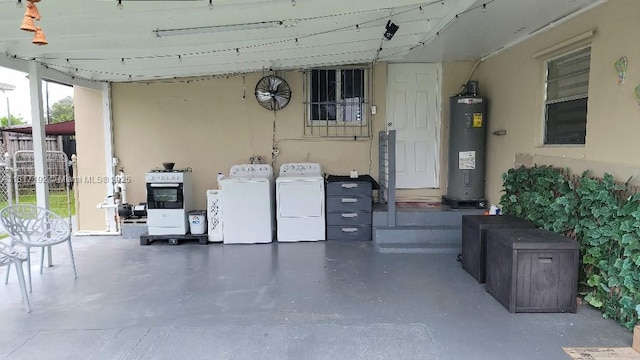 200 W 53rd Ter, Hialeah, FL 33012 - laundry area with separate washer and dryer, electric water heater, and healthy amount of natural light