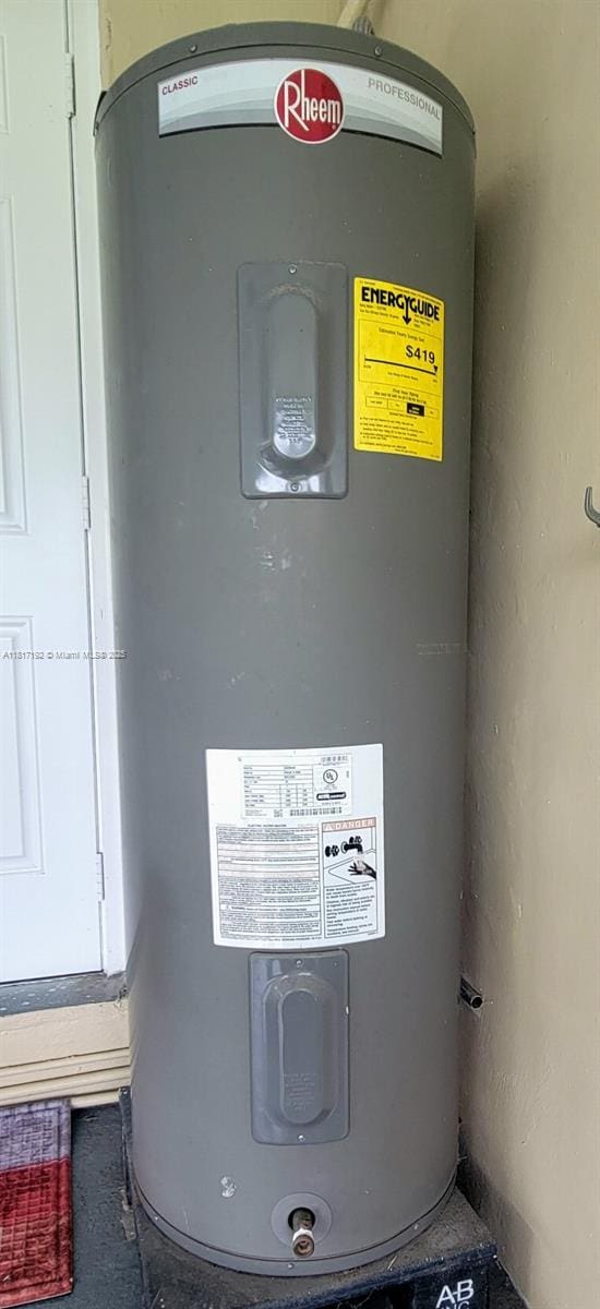 200 W 53rd Ter, Hialeah, FL 33012 - utility room featuring water heater