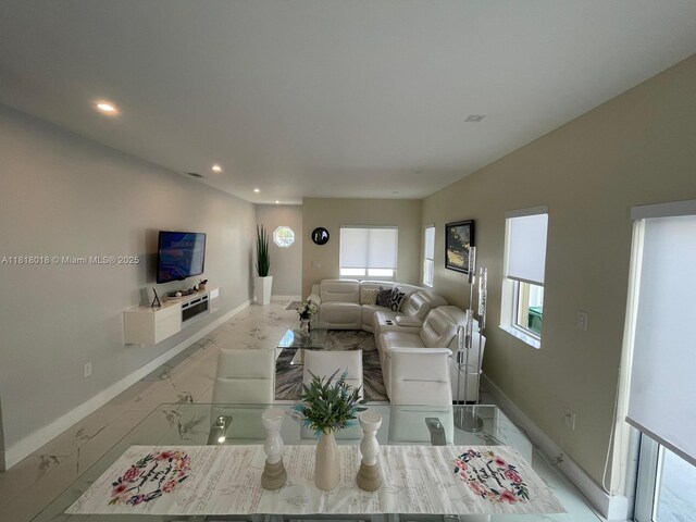 12453 SW 197th Ter, Miami, FL 33177 - living area featuring marble finish flooring, baseboards, and recessed lighting