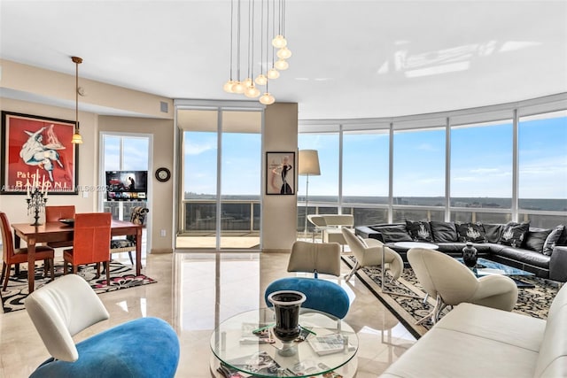18101 Collins Ave Unit 5401, Sunny Isles Beach, FL 33160 - living area with expansive windows and light tile patterned flooring