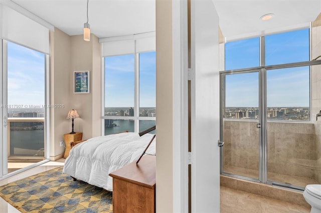 18101 Collins Ave Unit 5401, Sunny Isles Beach, FL 33160 - tiled bedroom with a wall of windows and a water view