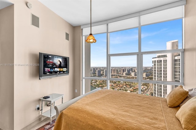 18101 Collins Ave Unit 5401, Sunny Isles Beach, FL 33160 - bedroom featuring expansive windows and multiple windows