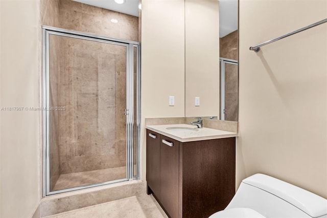 18101 Collins Ave Unit 5401, Sunny Isles Beach, FL 33160 - full bathroom featuring toilet, vanity, and a shower stall
