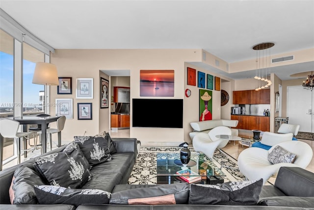18101 Collins Ave Unit 5401, Sunny Isles Beach, FL 33160 - living room with a chandelier and expansive windows