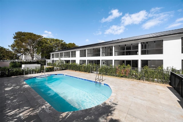200 Sunrise Dr Unit 200A, Key Biscayne, FL 33149 - community pool featuring a patio