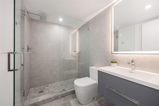 200 Sunrise Dr Unit 200A, Key Biscayne, FL 33149 - bathroom with tiled shower, vanity, toilet, tile walls, and recessed lighting