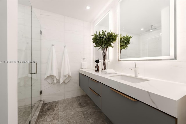 200 Sunrise Dr Unit 200A, Key Biscayne, FL 33149 - bathroom featuring double vanity, a marble finish shower, and tile walls