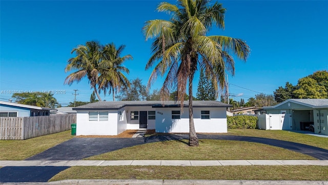 6113 NW 18th St, Margate, FL 33063 - ranch-style house with stucco siding and asphalt driveway