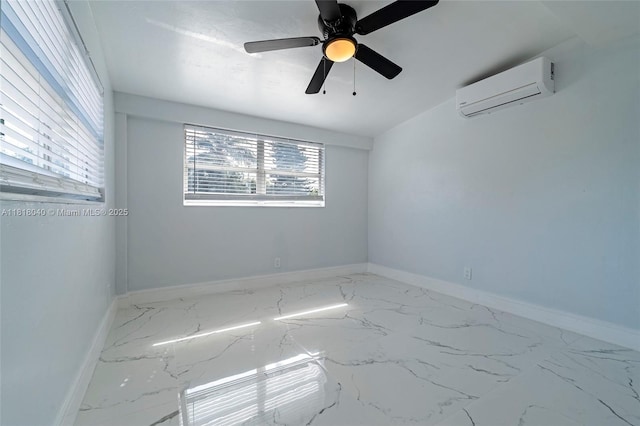 6113 NW 18th St, Margate, FL 33063 - unfurnished room with a wall unit AC, marble look tiles, and baseboards
