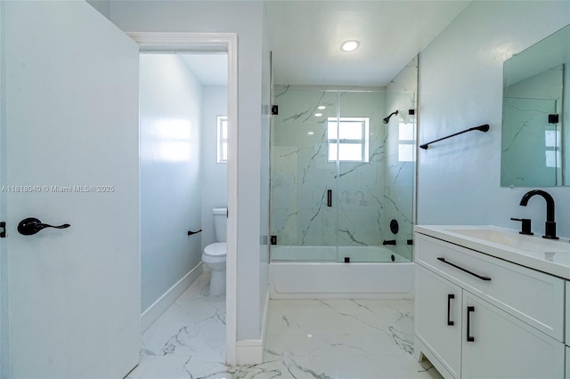 6113 NW 18th St, Margate, FL 33063 - bathroom featuring toilet, vanity, enclosed tub / shower combo, baseboards, and marble finish floors