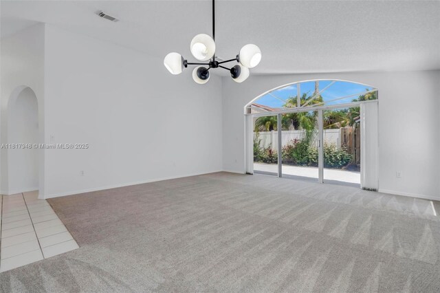 1061 NW 191st Ave, Pembroke Pines, FL 33029 - empty room with carpet floors, a chandelier, and baseboards