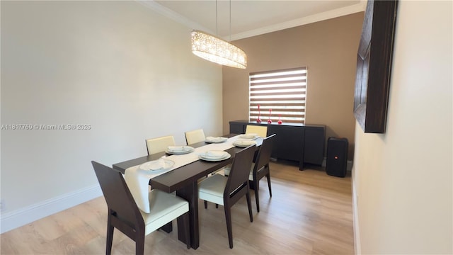 4221 Laurel Ridge Cir, Weston, FL 33331 - dining area with light wood-style flooring, crown molding, and a chandelier