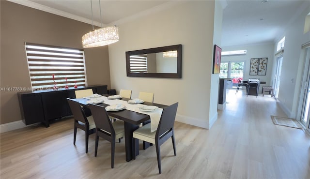 4221 Laurel Ridge Cir, Weston, FL 33331 - dining room with light wood-type flooring, crown molding, and a chandelier