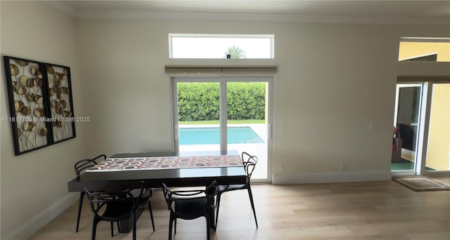 4221 Laurel Ridge Cir, Weston, FL 33331 - dining space featuring ornamental molding and light wood finished floors