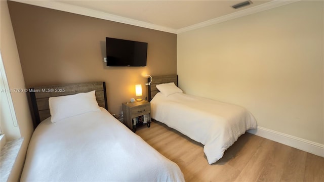 4221 Laurel Ridge Cir, Weston, FL 33331 - bedroom featuring wood finished floors and crown molding