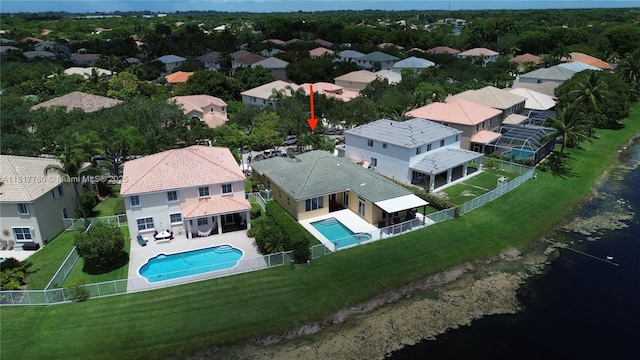 4221 Laurel Ridge Cir, Weston, FL 33331 - aerial perspective of suburban area featuring a pool area and a large body of water