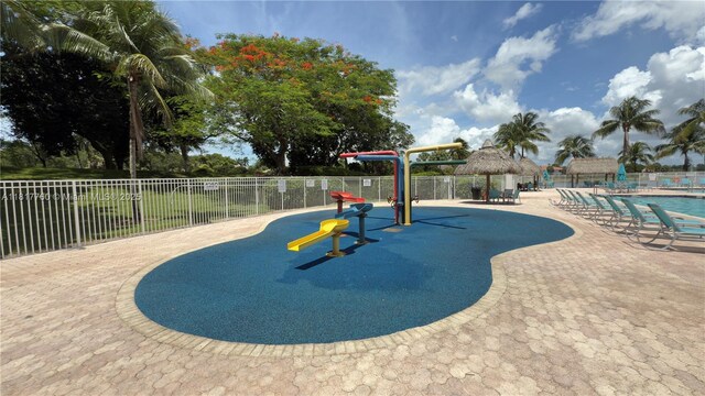 4221 Laurel Ridge Cir, Weston, FL 33331 - view of community with a pool and a patio