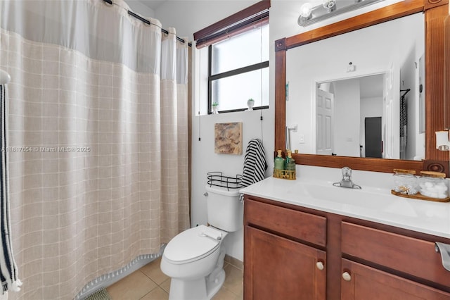 685 SE 34th Ter, Homestead, FL 33033 - bathroom with tile patterned flooring, toilet, vanity, and a shower with curtain