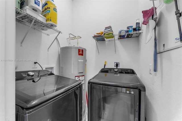 685 SE 34th Ter, Homestead, FL 33033 - laundry room featuring washer and clothes dryer