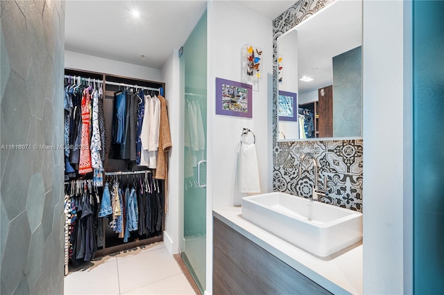 1040 Biscayne Blvd Unit 3607, Miami, FL 33132 - full bath featuring a spacious closet, a stall shower, vanity, and tile patterned flooring