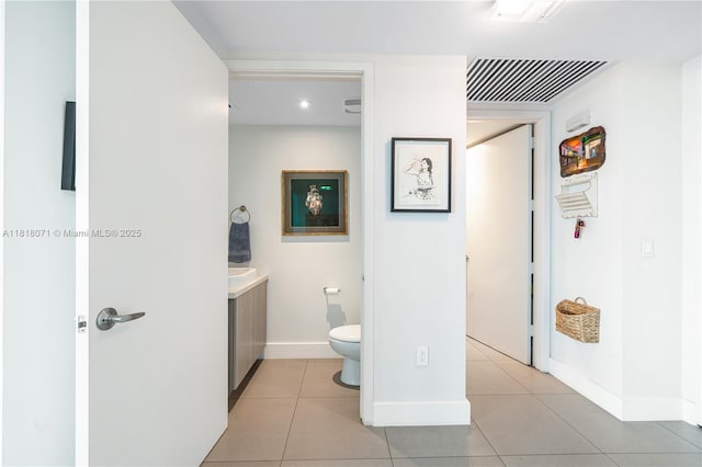 1040 Biscayne Blvd Unit 3607, Miami, FL 33132 - bathroom featuring toilet, vanity, tile patterned flooring, baseboards, and recessed lighting