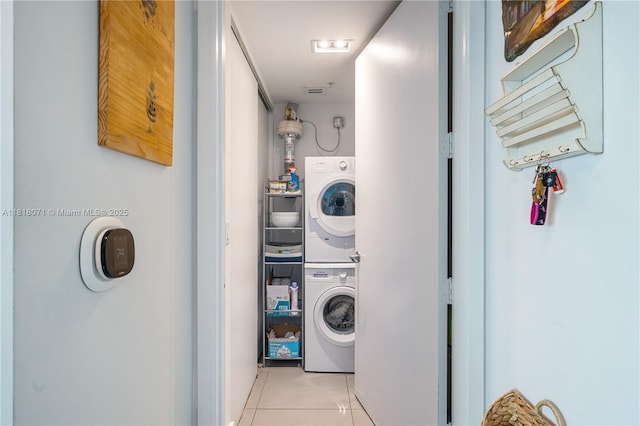 1040 Biscayne Blvd Unit 3607, Miami, FL 33132 - laundry room with estacked washer and dryer and light tile patterned floors