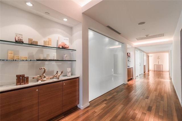 1040 Biscayne Blvd Unit 3607, Miami, FL 33132 - corridor with hardwood / wood-style flooring and recessed lighting