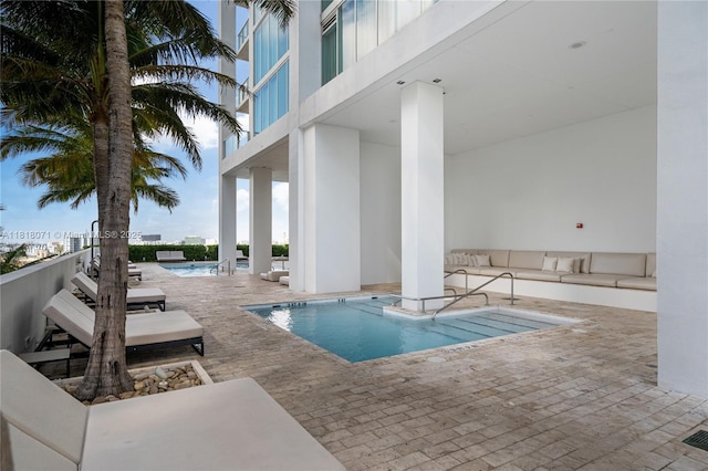 1040 Biscayne Blvd Unit 3607, Miami, FL 33132 - community pool with an outdoor hangout area and a patio area