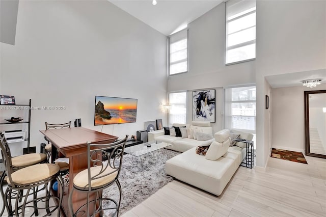 2730 NE 183rd St Unit Th03, Aventura, FL 33160 - living room featuring high vaulted ceiling