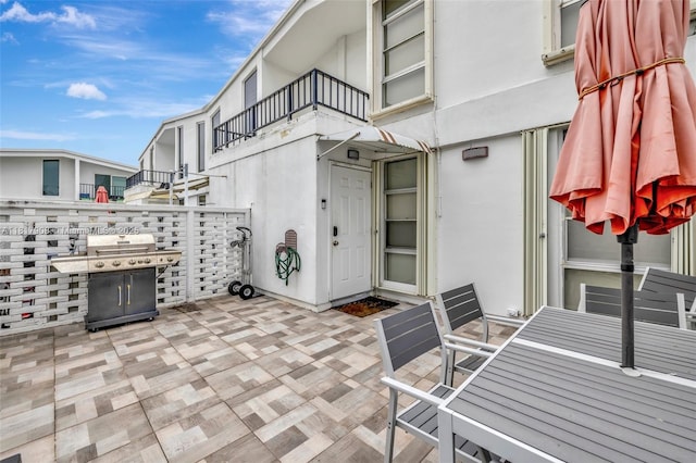 2730 NE 183rd St Unit Th03, Aventura, FL 33160 - view of patio with grilling area and a balcony