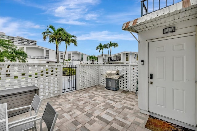 2730 NE 183rd St Unit Th03, Aventura, FL 33160 - view of patio / terrace featuring area for grilling and a gate