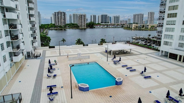 2730 NE 183rd St Unit Th03, Aventura, FL 33160 - community pool featuring a view of skyline, a water view, and a patio area