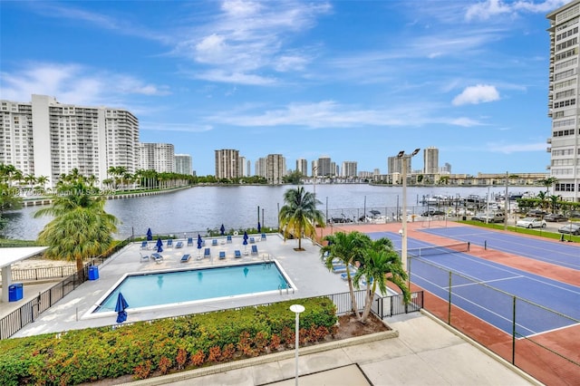 2730 NE 183rd St Unit Th03, Aventura, FL 33160 - community pool featuring a water view, a skyline view, and a patio area