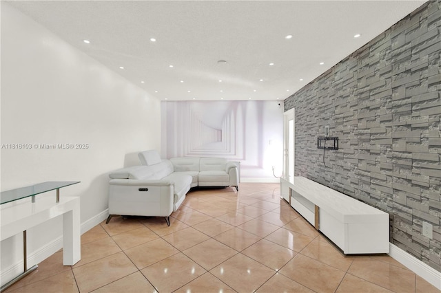 5665 W 20th Ave Unit 415, Hialeah, FL 33012 - living room with light tile patterned flooring, recessed lighting, and baseboards