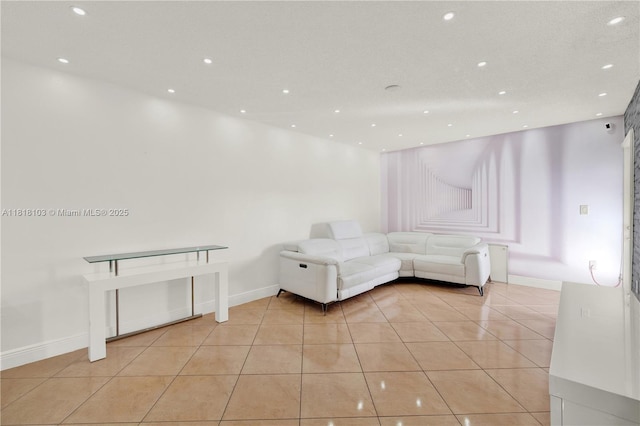 5665 W 20th Ave Unit 415, Hialeah, FL 33012 - living room with light tile patterned floors, recessed lighting, and baseboards