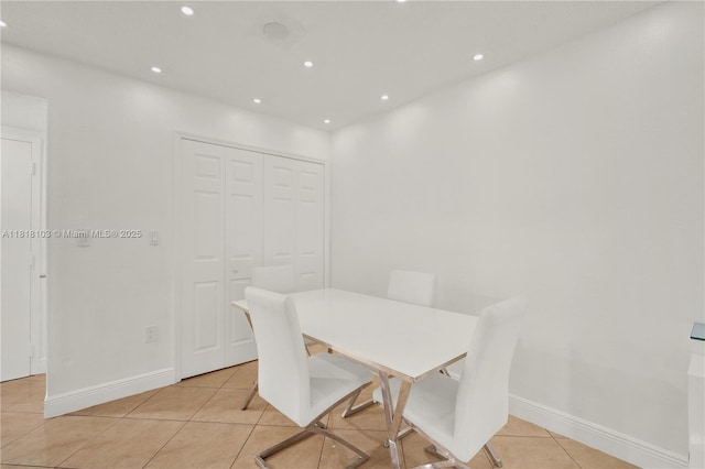 5665 W 20th Ave Unit 415, Hialeah, FL 33012 - dining room featuring light tile patterned flooring, recessed lighting, and baseboards