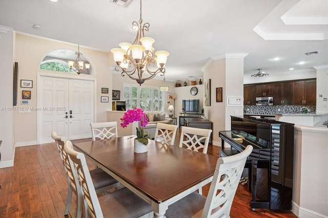 13357 SW 42nd St, Davie, FL 33330 - dining area featuring a chandelier, wood finished floors, baseboards, recessed lighting, and crown molding