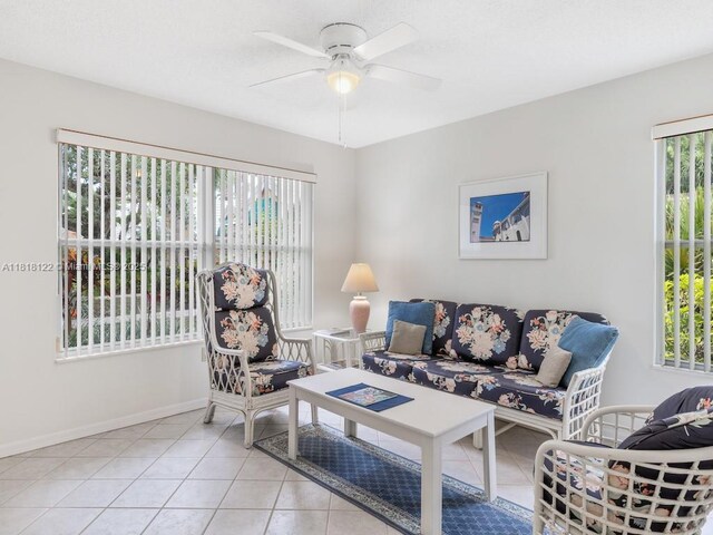 1354 Coral Park Ln Unit 603, Vero Beach, FL 32963 - home office featuring light tile patterned flooring, a ceiling fan, and baseboards