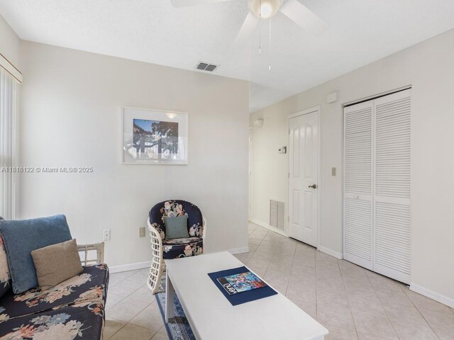 1354 Coral Park Ln Unit 603, Vero Beach, FL 32963 - kitchen with white appliances, plenty of natural light, baseboards, and white cabinetry