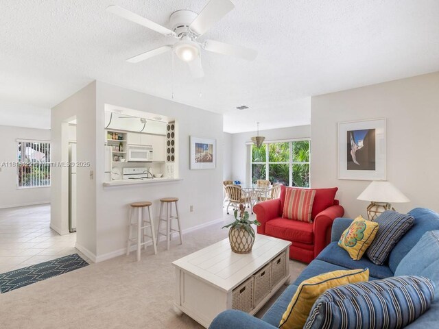 1354 Coral Park Ln Unit 603, Vero Beach, FL 32963 - dining area featuring light colored carpet, healthy amount of natural light, french doors, and baseboards