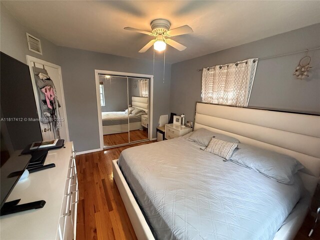 7840 SW 55th Ave Unit 23C, Miami, FL 33143 - bedroom featuring a closet, dark wood-style floors, and a ceiling fan