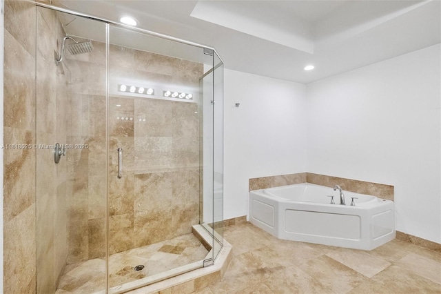 3030 NE 188th St Unit 609, Aventura, FL 33180 - bathroom featuring a garden tub, a shower stall, recessed lighting, and baseboards