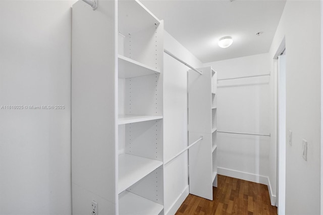 3030 NE 188th St Unit 609, Aventura, FL 33180 - spacious closet featuring wood finished floors