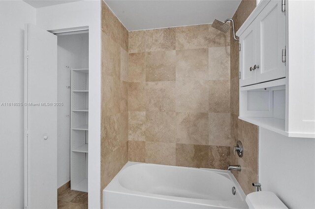 3030 NE 188th St Unit 609, Aventura, FL 33180 - bathroom featuring shower / bath combination, toilet, and a closet