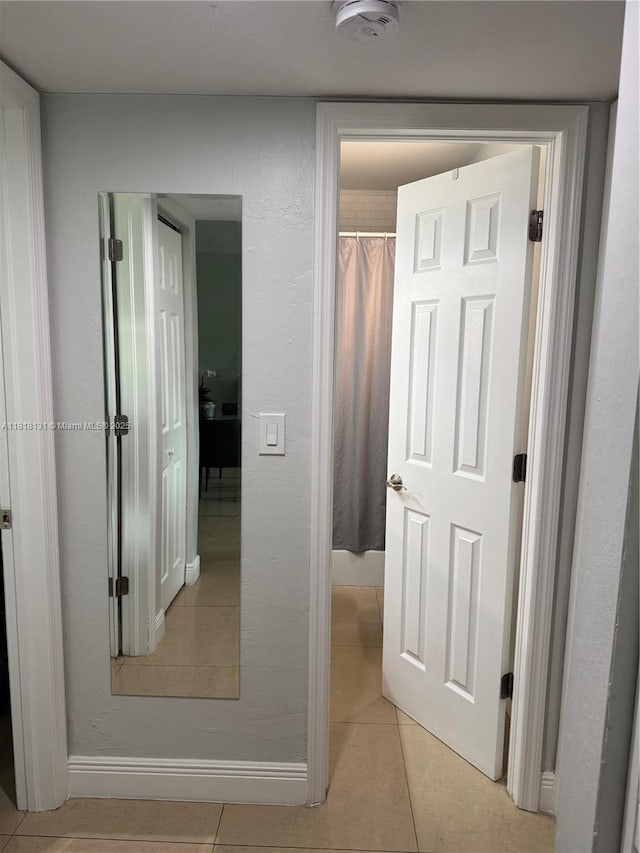 14036 SW 90th Ave Unit 201-Aa, Miami, FL 33176 - corridor with light tile patterned flooring