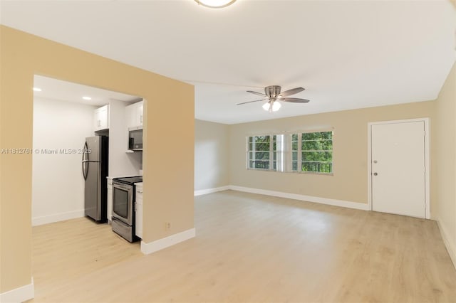 13255 SW 7th Ct Unit 303D, Pembroke Pines, FL 33027 - unfurnished living room with light wood-style floors, a ceiling fan, and baseboards