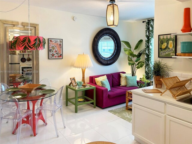 335 Ocean Dr Unit 114, Miami Beach, FL 33139 - living area with light tile patterned floors