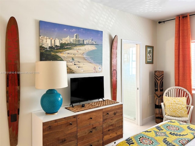 335 Ocean Dr Unit 114, Miami Beach, FL 33139 - bedroom with multiple windows and baseboards